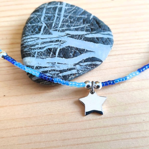 Collana con perline colorate e ciondolo stellina - immagine 6